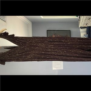 Trina Turk black jumpsuit with gold accents